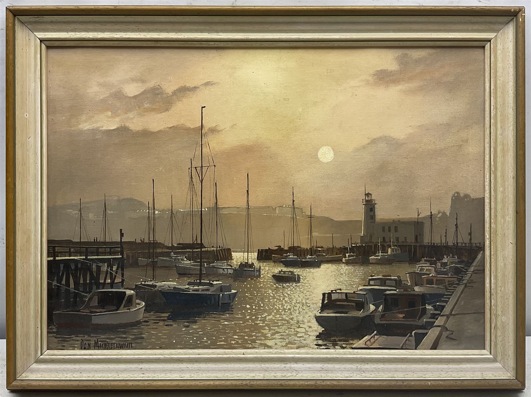 Don Micklethwaite (British 1936-): Scarborough Harbour at Sunset, oil on canvas board signed 34cm x 49cm

