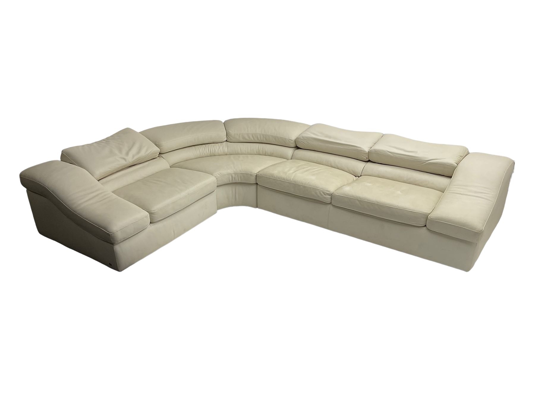 Natuzzi - 'Wave' corner sofa, upholstered in cream leather, in three sections with adjustable back rests 