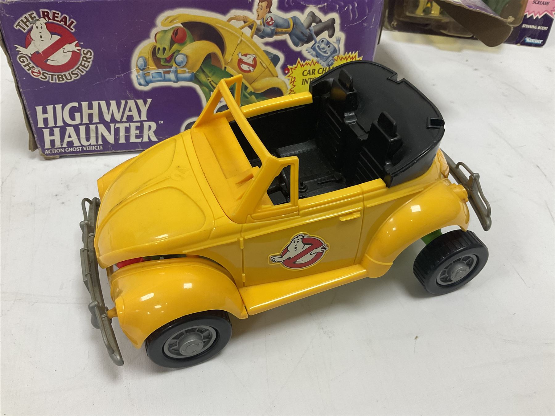 Ghostbusters - 'ECTO 1' car with two figures; ECTO-2 Vehicle, Highway Hunter Action Ghost Vehicle and Haunted Vehicles Air Sickness; all boxed; racing car with Egon Spengler driver; two 1984 Marshmallow Man figures; and four unopened carded/boxed figures etc