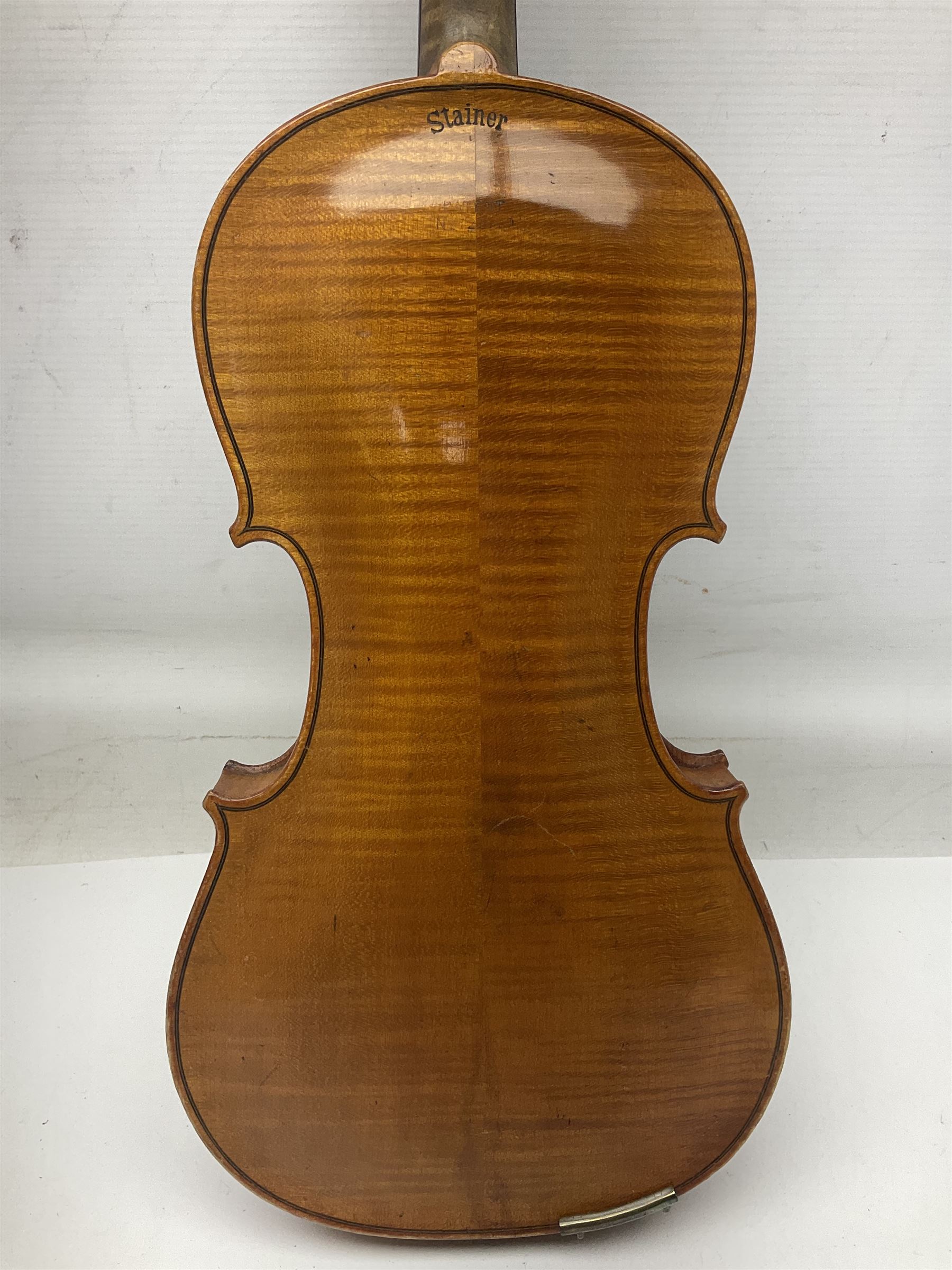 German violin c1900 stamped Stainer with 36cm two-piece maple back and ribs and spruce top L59.5cm overall; in simulated reptile skin carrying case