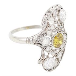 Early 20th century platinum diamond swirl ring, the principal old cut fancy yellow diamond of approx 0.50 carat, surrounded by old cut and single cut diamonds, in a milgrain pierced foliate design setting, total diamond weight approx 1.25 carat, with GCS certificate