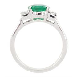 18ct white gold emerald and diamond ring, single oval cut emerald, each side set with three princess cut diamonds, stamped 750, emerald approx 1.90 carat, total diamond weight approx 0.50 carat