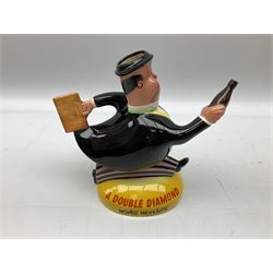 Beswick 'Double Diamond Works Wonders' advertising decanter in the form of a business man with briefcase and bottle, with impressed and printed marks beneath