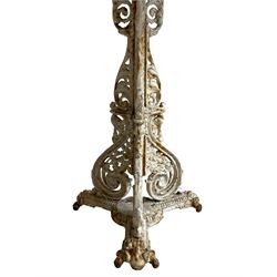 Coalbrookdale design - 19th century cast iron and cast alloy garden table, circular top with beaded edge pierced with scrolls, the pedestal decorated with scrolling and foliate motifs triple arm platform bass with scrolled feet