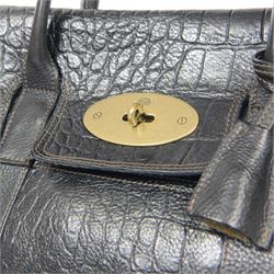 Mulberry Bayswater handbag, black mock crocodile-embossed leather with rolled leather top handles and brass hardware, the front secured by an oval Postman’s Lock stamped with the Mulberry tree motif, the interior lined in tan suede with zip pocket and slip compartments, leather brand tab stamped Mulberry, together with original Mulberry dust bag, W36cm D16cm H26cm