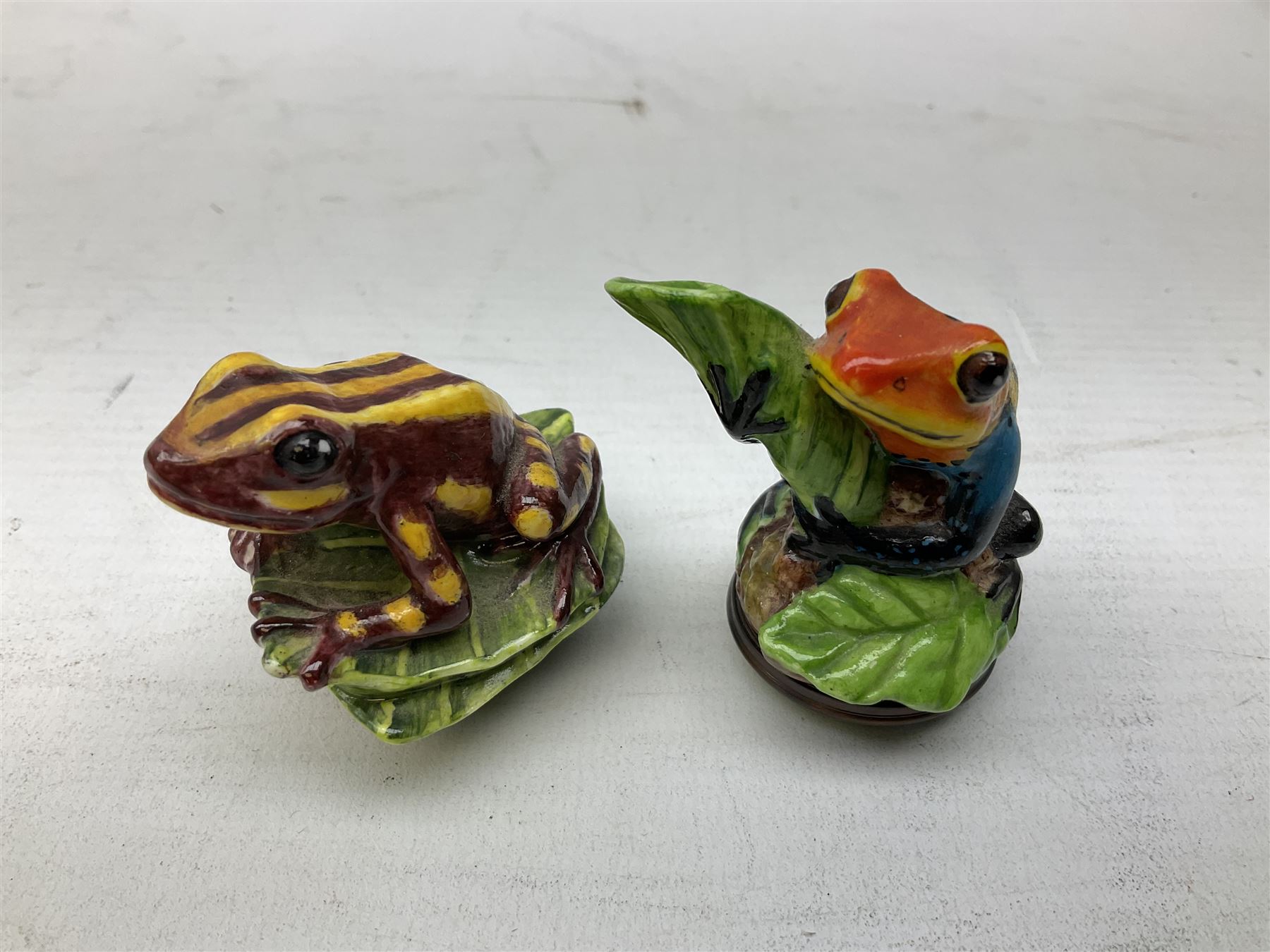Four Halcyon Days bonbonnieres modelled as frogs, Golden Toad, Red-eyed frog, Dart-poison frog, and Poison Dart frog, in single box 