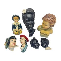 Art Deco plaster female bust, marked Arnova 353, together with a collection of wall masks 