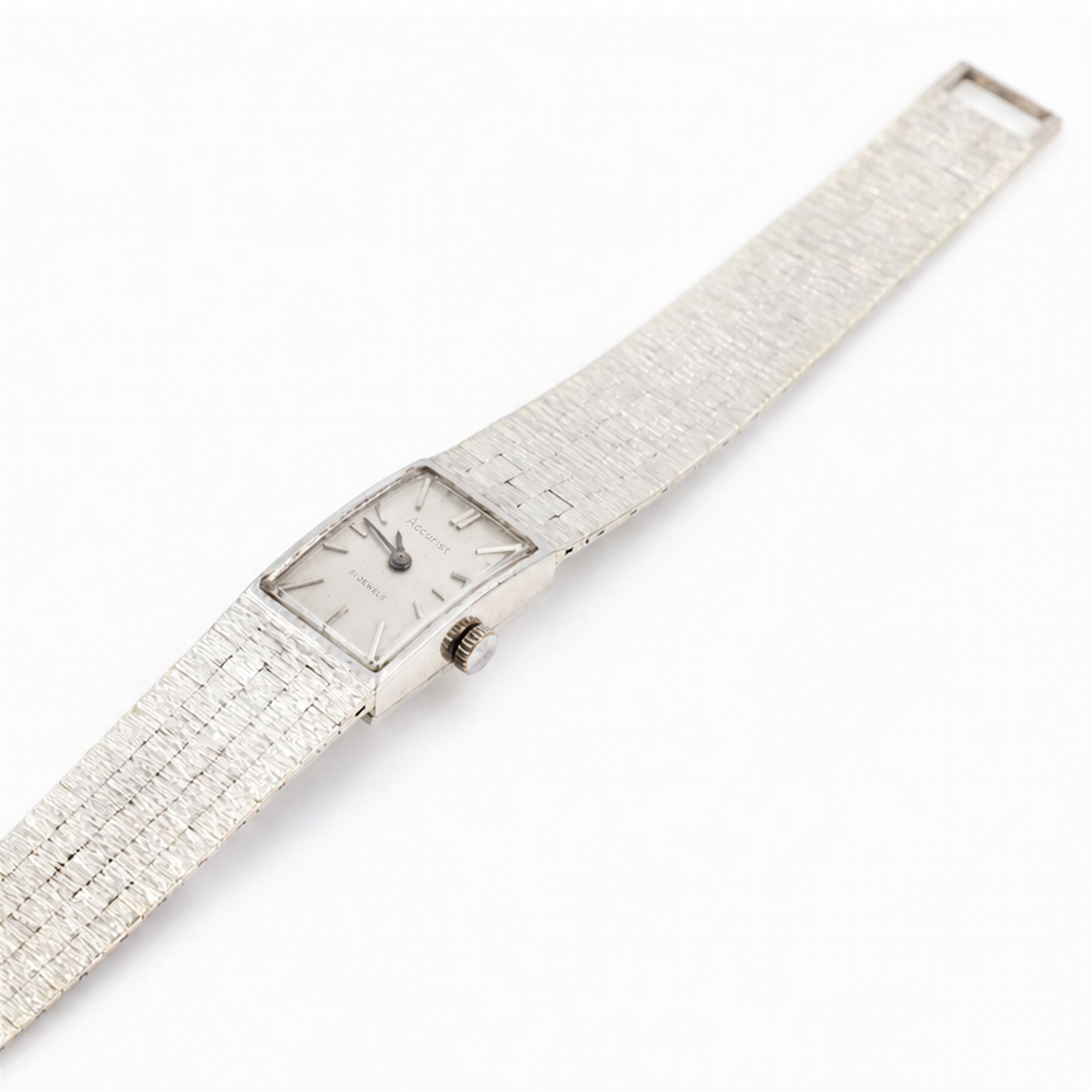 Accurist ladies 9ct white gold manual wind wristwatch, silvered dial with baton hour markers, on integral 9ct bracelet, London 1969