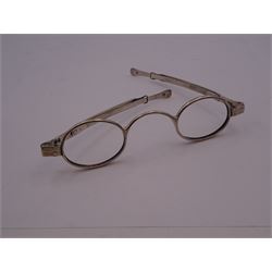 Pair of Georgian silver spectacles, with extending arms, part marks visible, lion passant and date letter 'h', probably London 1823