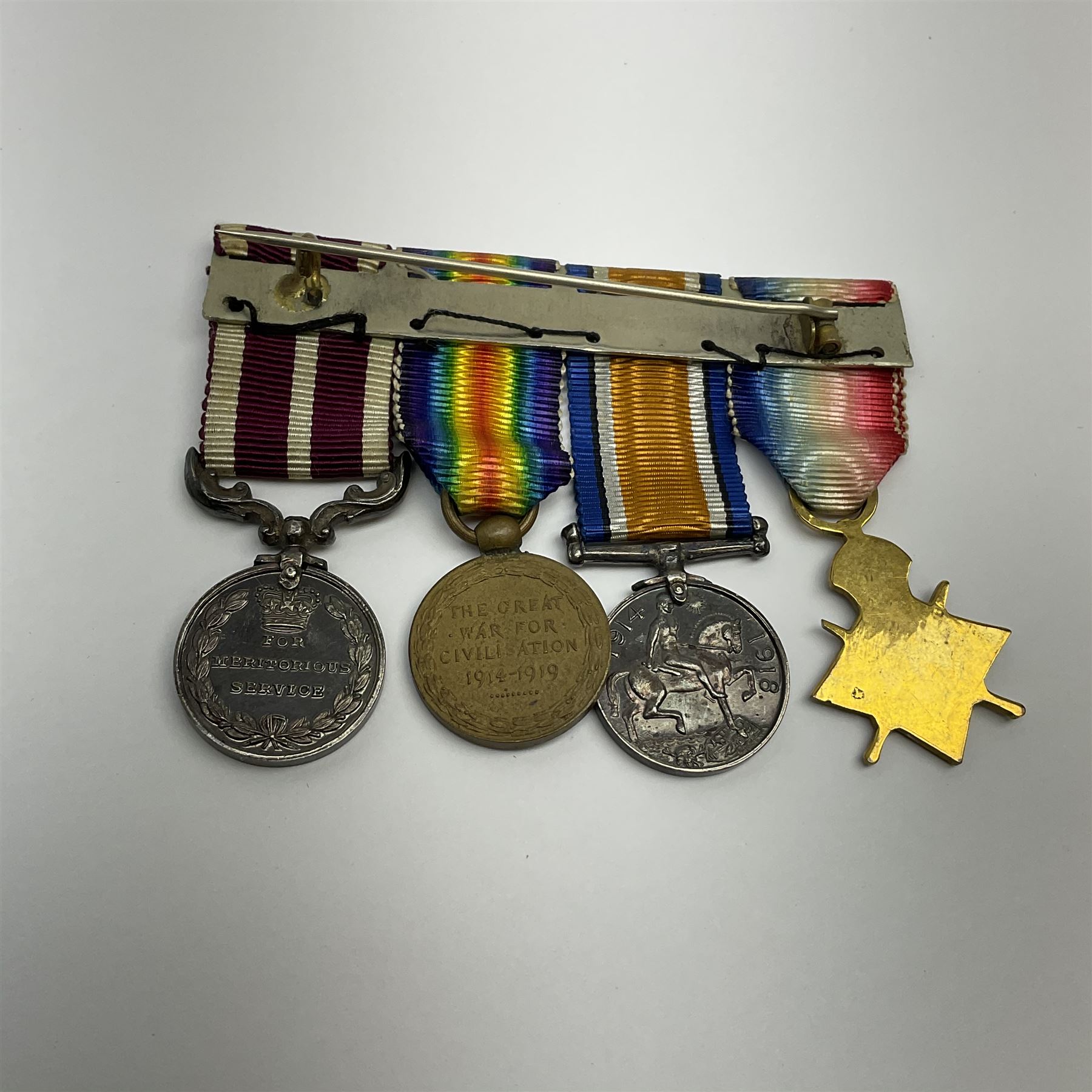 WW1 group of four miniature medals comprising 1914-15 Star, British War Medal, Victory Medal and George V Army meritorious Service Medal, on bar with ribbons