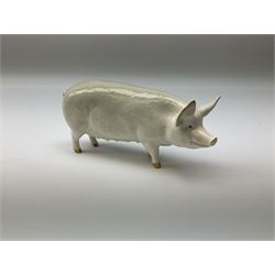Collection of Beswick figures, comprising pig 'CH wall queen' 40 model no 1452a, black faced ewe model no 165, lamb model no 1828 and sitting fox 1748. 