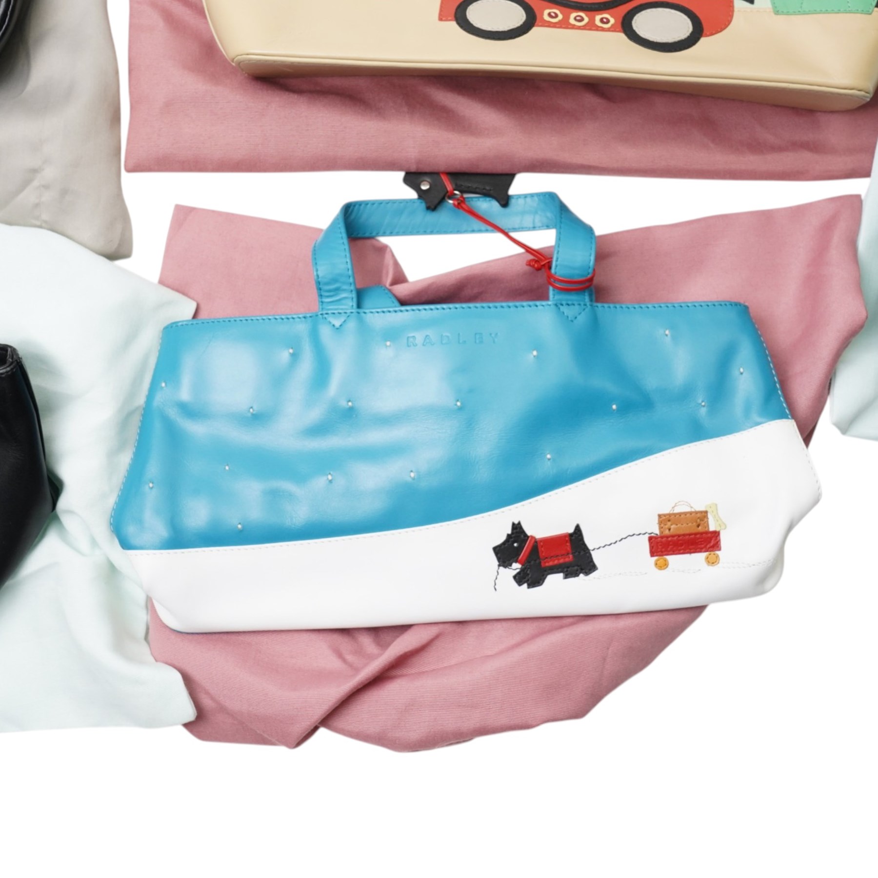 Seven Radley handbags with dustcovers