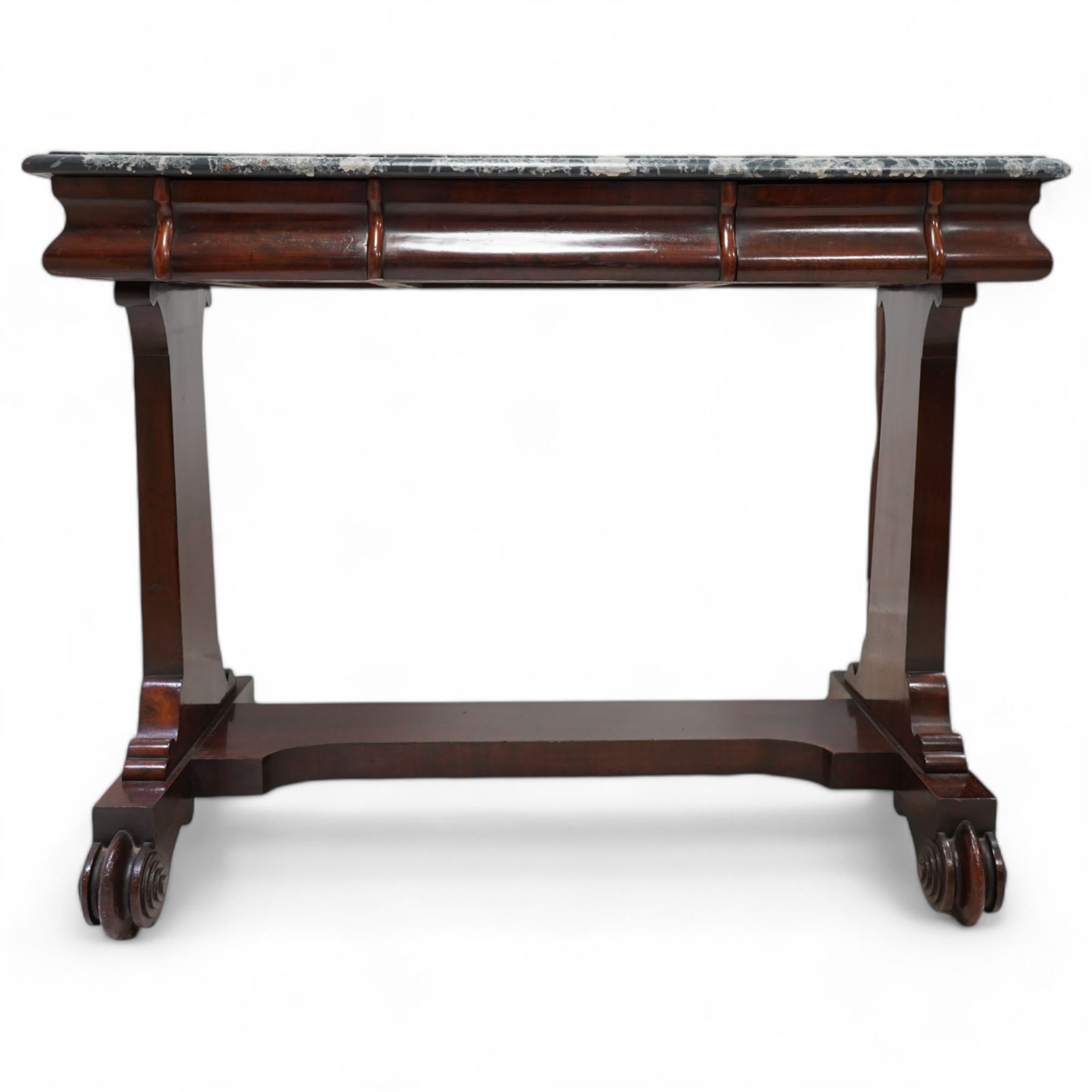 19th century mahogany side table, moulded rectangular top with simulated marble finish, ogee moulded frieze fitted with two drawers, rectangular and supports on scroll carved feet united by flat stretcher 