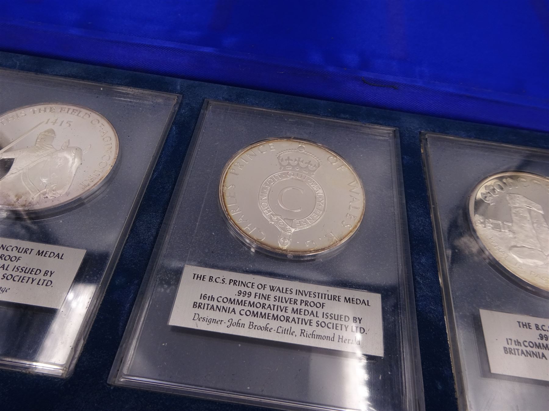 British Commemorative Society Ltd, set of six commemorative .999 fine silver proof medals, no. 13 to 18 , to include The Dunkirk Medal, The Captain Cook Medal, The Battle of Agincourt Medal, The Prince of Wales Investiture Medal, The Stonehenge Medal and The Queen Elizabeth Medal, each contained within clear perspex cases, in a silk lined fitted case