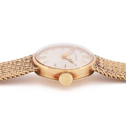 Eterna ladies 9ct gold manual wind wristwatch, silvered dial with baton hour markers, on integral 9ct gold bracelet, London 1968