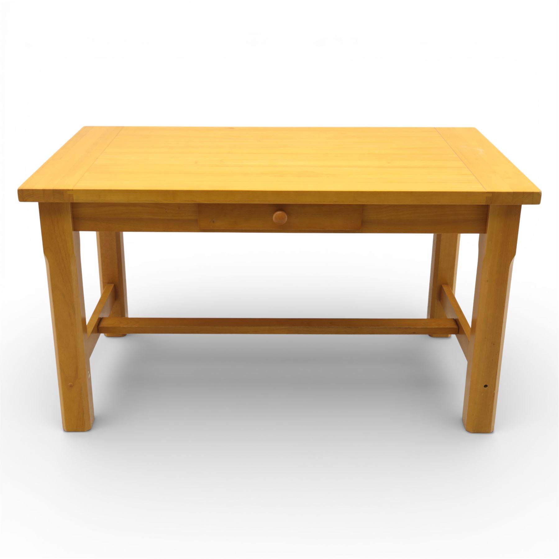 Solid oak dining table and set of seven pine farmhouse chairs including two carvers, rectangular top with tongue and groove style finish, supported a 'H' stretcher with square chamfered legs, pine farmhouse chairs with central splat and turned legs