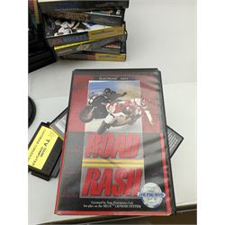 Eighteen Sega Mega Drive games, including Sonic The Hedgehog, Sonic The Hedgehog 2, Alienstorm, Desert Strike, Fatal Rewind, Road Rash etc, all boxed, together with a Sega Mega Drive controller, cartridge converter and an arcade power stick controller