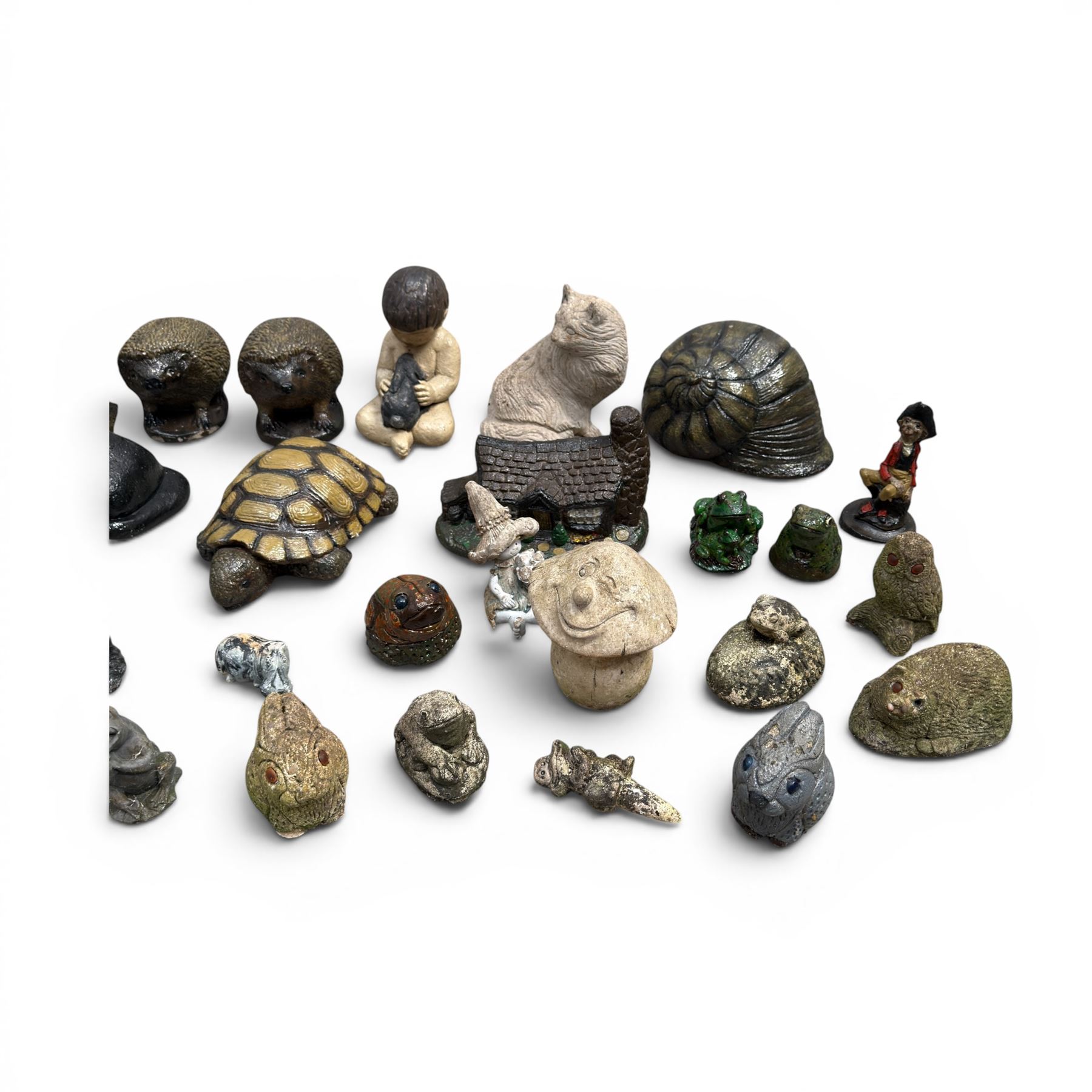 Collection of 33 small glazed cast stone garden animals and figures