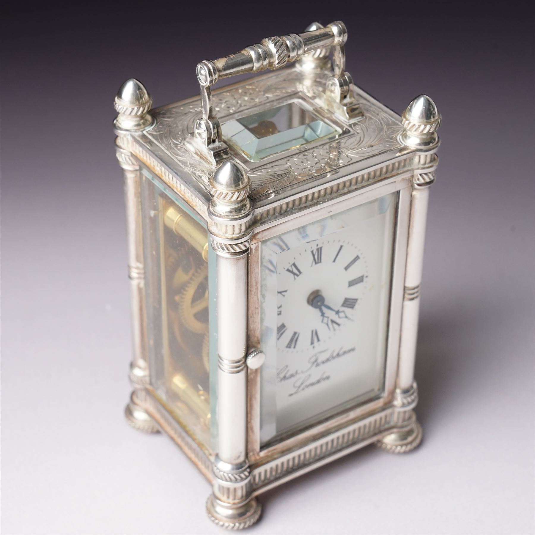 Chas Frodsham, London - Miniature carriage clock with white dial in engraved silver case on compressed bun feet, London assay H10cm 