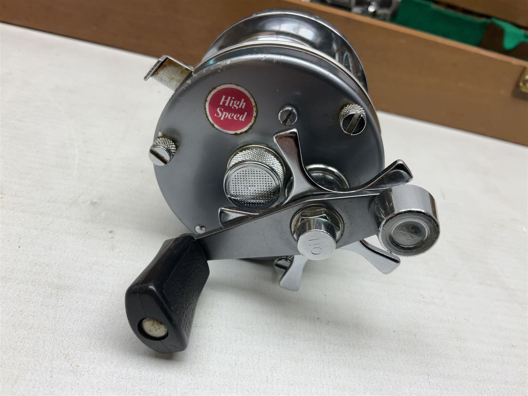 Four Abu fishing reels, comprising Ambassadeur 9000, Ambassadeur 7000, Ambassadeur 5500 and Ambassadeur 6500, together with additional line, hardy fishing bag and two wooden boxes