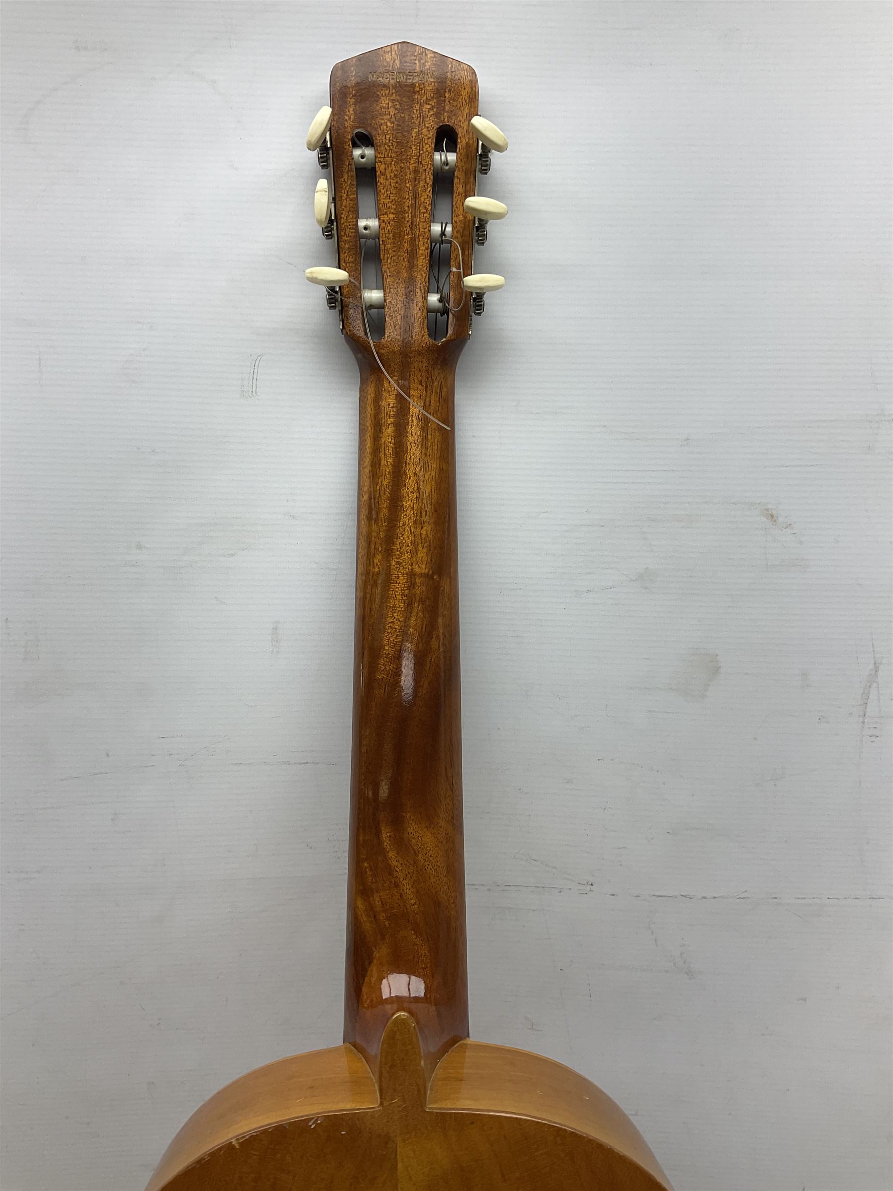 Encore black electric cut-away guitar L96cm; and Spanish Victor Garcia model 187 acoustic guitar, bears label dated 1972 L99cm; each in soft carrying case (2)