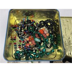 Silver ammonite pendant, silver earrings and a collection of beaded and other costume jewellery