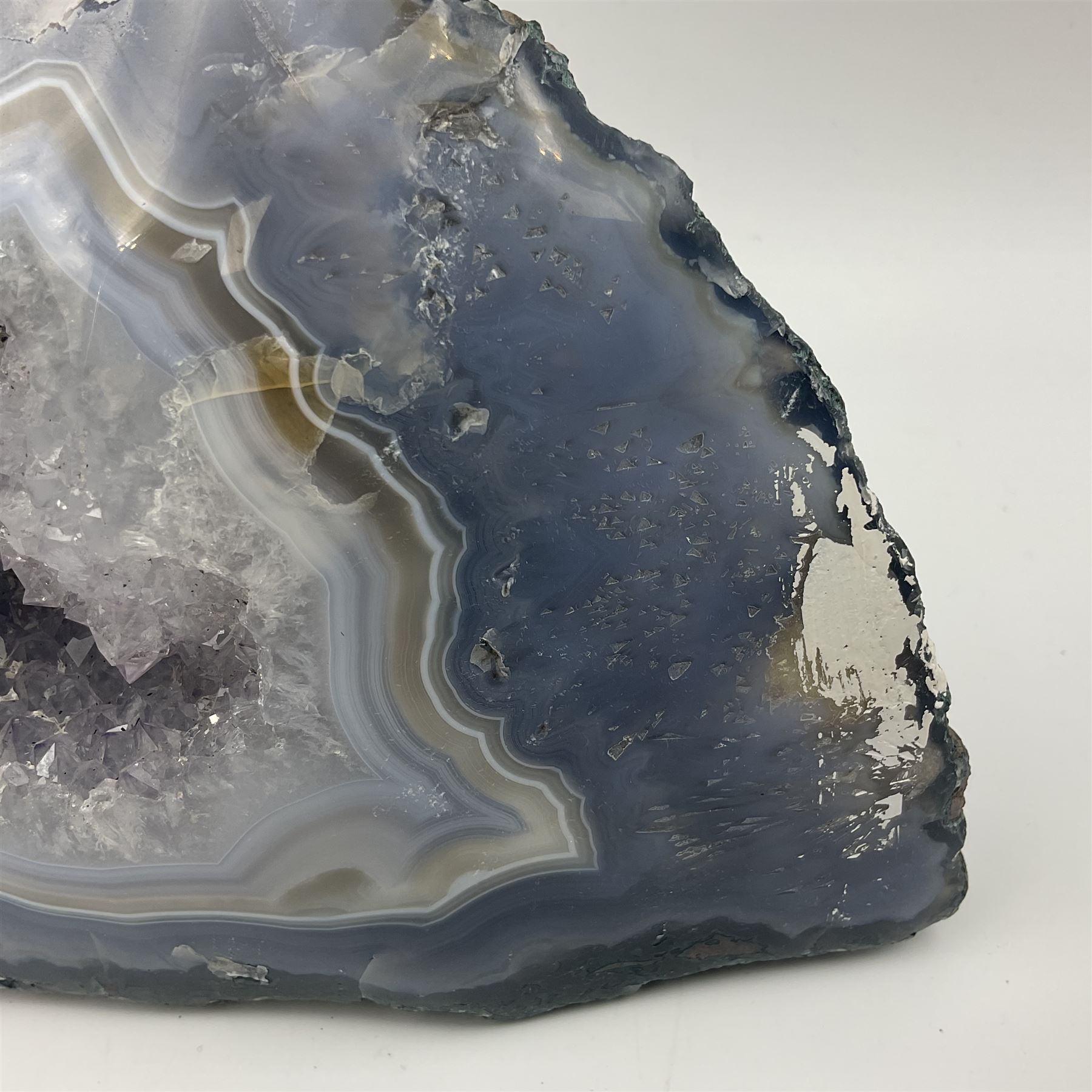 Amethyst crystal geode cluster, with well-defined crystals of various sizes, in purple tones, H12cm 