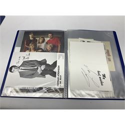 Two folders of over fifty photographs, cards, compliment slips etc of actors, actresses, celebrities, politicians, sports personalities etc, all bearing signatures, including David Frost, Lloyd Grosman, John Suchet, Julia Somerville and othe GMTV presenters, Carol Vorderman, Jackie Collins, Rolf Harris, Timothy Dalton, Pete Postlethwaite, Magnus magnusson, John Major, Kate Moss, Uri Geller, David Beckham, Peter Alliss, Sharon Davies, Kevin Keegan etc