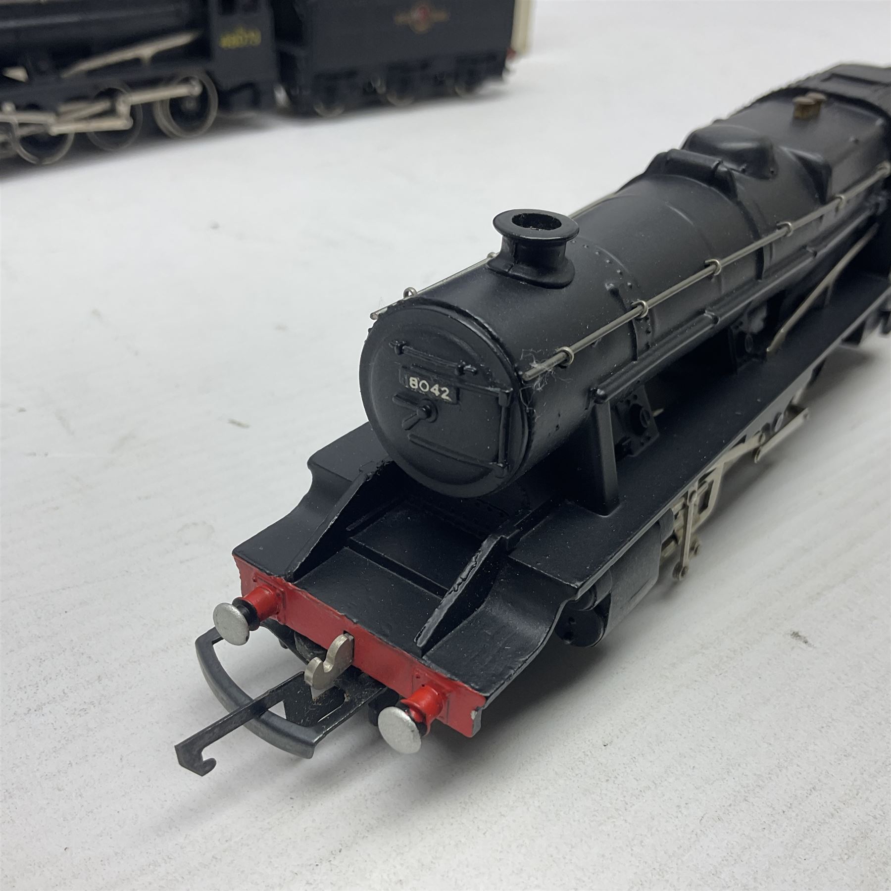 Wrenn '00' gauge - two Class 8F 2-8-0 locomotives - No.48073 in BR Plain Black; boxed; and No.8042 in LMS Plain Black; with unassociated plain blue box (2)