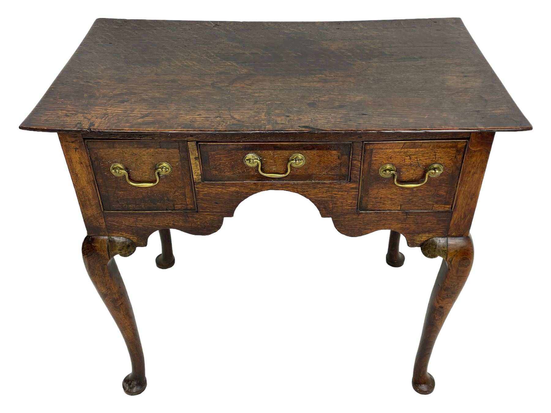 18th century oak low-boy, rectangular top over three crossbanded and cock-beaded drawers, ogee and stepped arch apron, on cabriole supports 