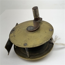 T. Aldred brass reel with silver mounted handle, D2.75