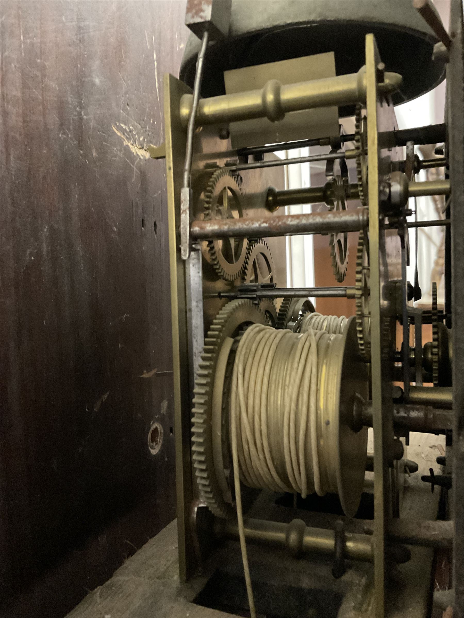 Grace Holborn of South Cave (Nr Hull Yorks.) -  Oak and mahogany 8-day longcase clock, c1820, with a pagoda topped pediment with inlay and three ball and spire finials, break arch painted dial flanked by two reeded pilasters with brass capitals, trunk with canted corners and a full length break arch door, square plinth on bracket feet, dial with upright Arabic numerals and geometric painted spandrels, depiction of an eagle and a snake to the arch,  with a seconds dial and calendar aperture, brass hands and seconds pointer, rack striking recoil anchor weight driven movement, striking the hours on a bell. With weights and pendulum.
Grace Holborn was most probably the widow of Charles William Holborn who was a clockmaker in South Cave 1759-1811.