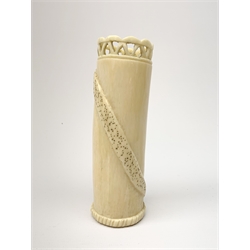 An African carved ivory spill vase, of cylindrical form with pierced rim and gadrooned band to base, the body decorated with snake and insect, signed to interior, H14cm.