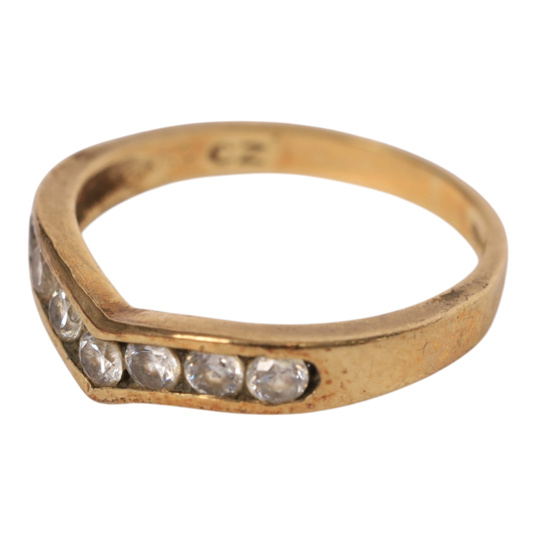 Four 9ct gold rings including cubic zirconia wishbone, all hallmarked