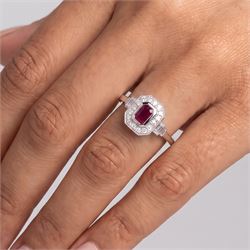 Platinum ruby and diamond ring, single octagonal cut ruby of approx 0.60 carat, with milgrain set round brilliant cut diamond surround and baguette cut diamond shoulders, hallmarked, total diamond weight approx 0.45 carat
