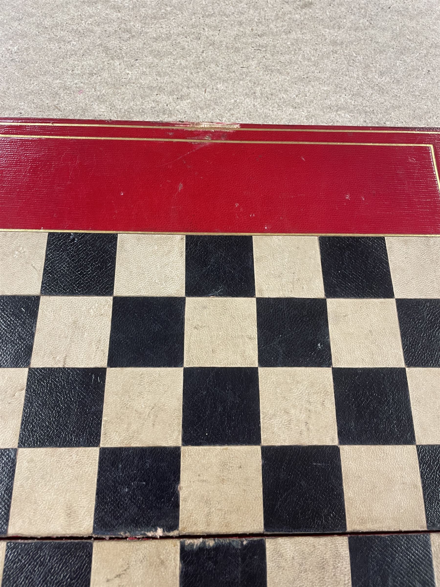 19th century walnut and brass bound games compendium box, painted to enhance the grain, of rectangular form, the hinged opening cover with rounded sides, central brass cartouche with engraved lion crest, and brass riveted straps, opening to reveal a red leather and blue silk lined compartmented interior, with fold-down games board, and lift-out tray containing playing cards, ebony turned dice towers, white and red stained bone draughts, and chess pieces, ivory dice, and ivory and ebony whist markers, and brass bezique board, cribbage board and markers, H15cm W32cm D24cm
This lot has been registered for sale under Section 10 of the APHA Ivory Act