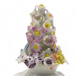Longton Hall floral table ornament, circa 1755, the moulded rococo base painted with floral sprays and sprigs, below a floral encrusted arrangement, unmarked, H14.5cm 