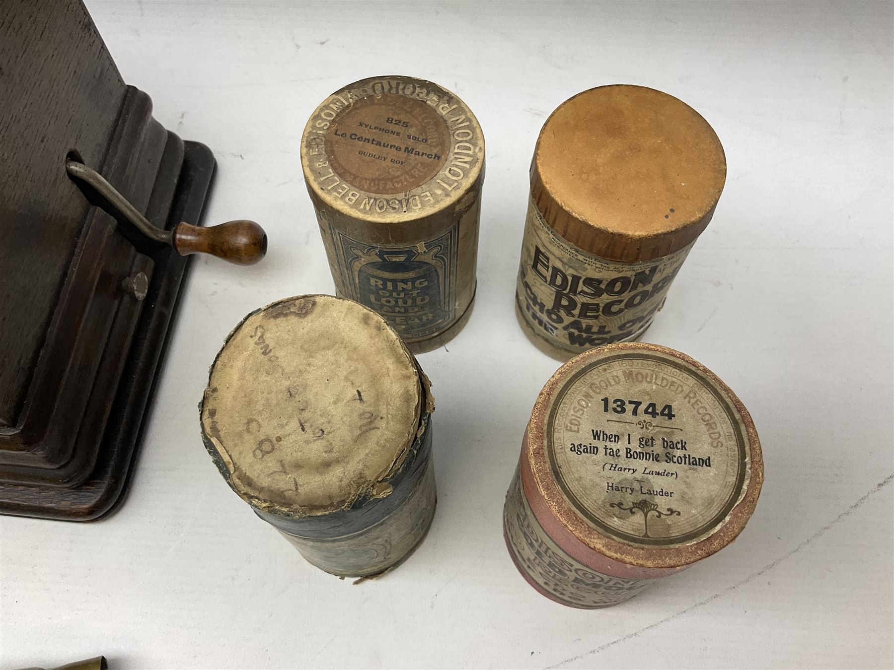 Edison Gem wind up phonograph, serial number 255655, with horn and eight cylinders, H21cm