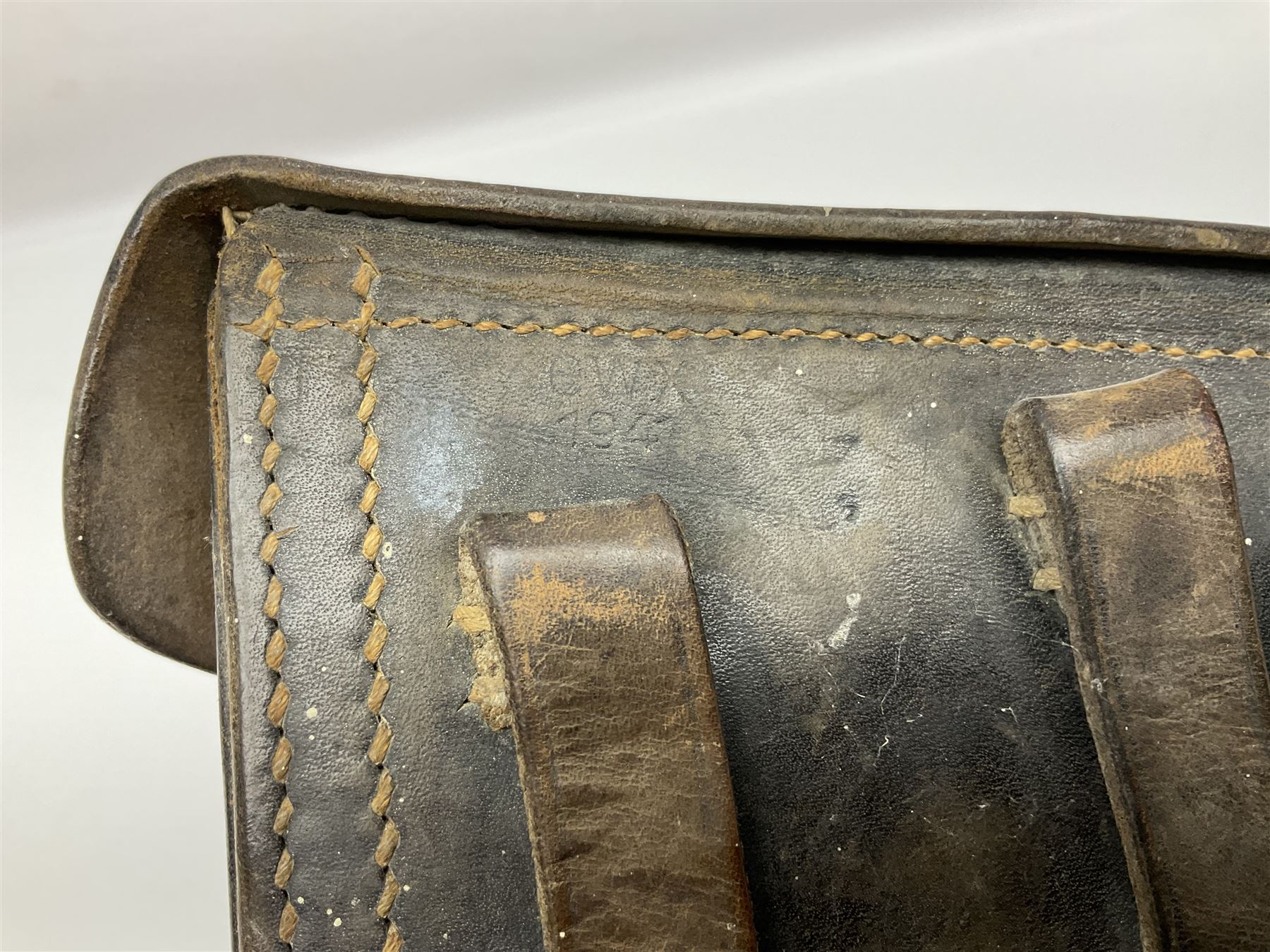 WWII German brown leather holster with side magazine pouch for a Walther P.38 semi-automatic pistol, stamped P38 and OWX 1941 on back L24.5cm