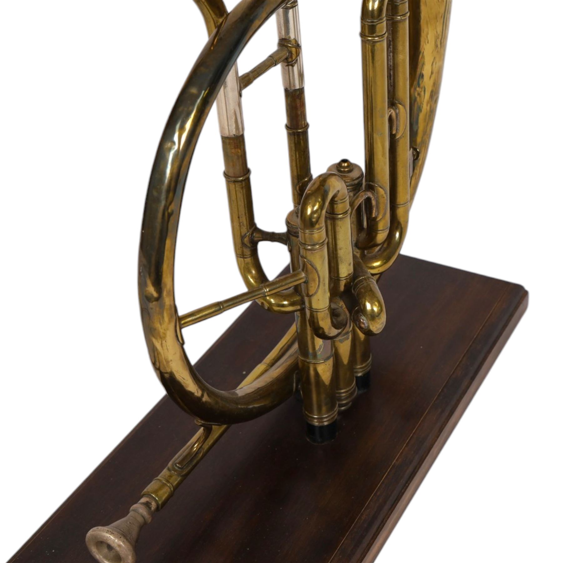Boosey & Co Ltd French horn, converted into a table lamp, upon a wooden plinth, H45cm