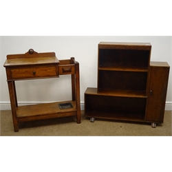  Art Deco oak bookcase, three staggered shelves flanked by single cupboard, on sledge feet (W91cm, H93cm, D24cm) and an oak hallstand, raised shaped back, single drawer, square supports joined by solid undertier with metal umbrella stand tray (W77cm, H87cm, D83cm)  