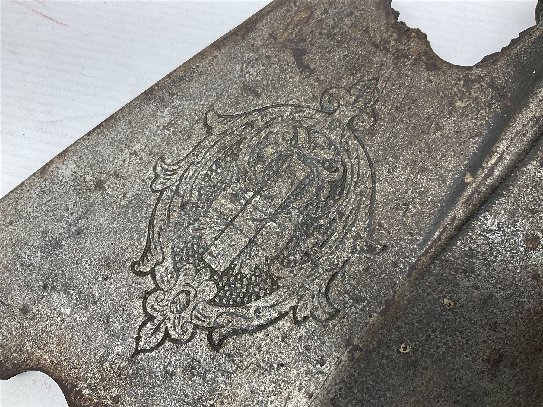 Moroccan jambiya dagger with 24.5cm plain curved blade stamped LONDON to the ricasso area, the hilt and scabbard overlaid with plain sheet brass to the back and ornate silver coloured metal to the front; waisted grip and arched pommel; two pyramid mounts to the scabbard L41cm overall; large billhook with curving blade and stacked leather washer grip; and a reproduction halberd blade (3)