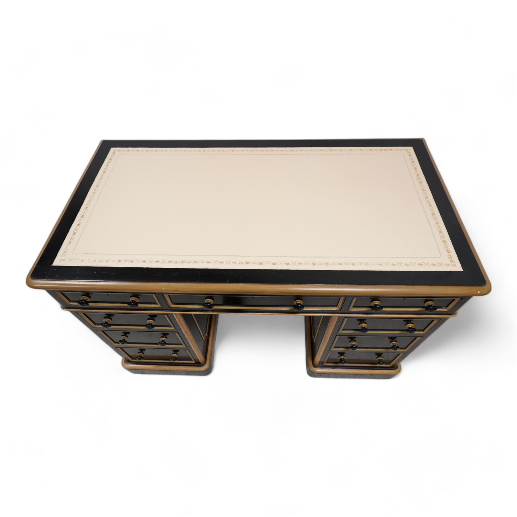 J. Maple & Co. (London: 1841-1988) - Victorian black painted and parcel gilt twin pedestal desk, moulded rectangular top with rounded corners and cream leather writing surface, fitted with nine drawers, on moulded plinth base, stamped 'J. Maple & Son' 