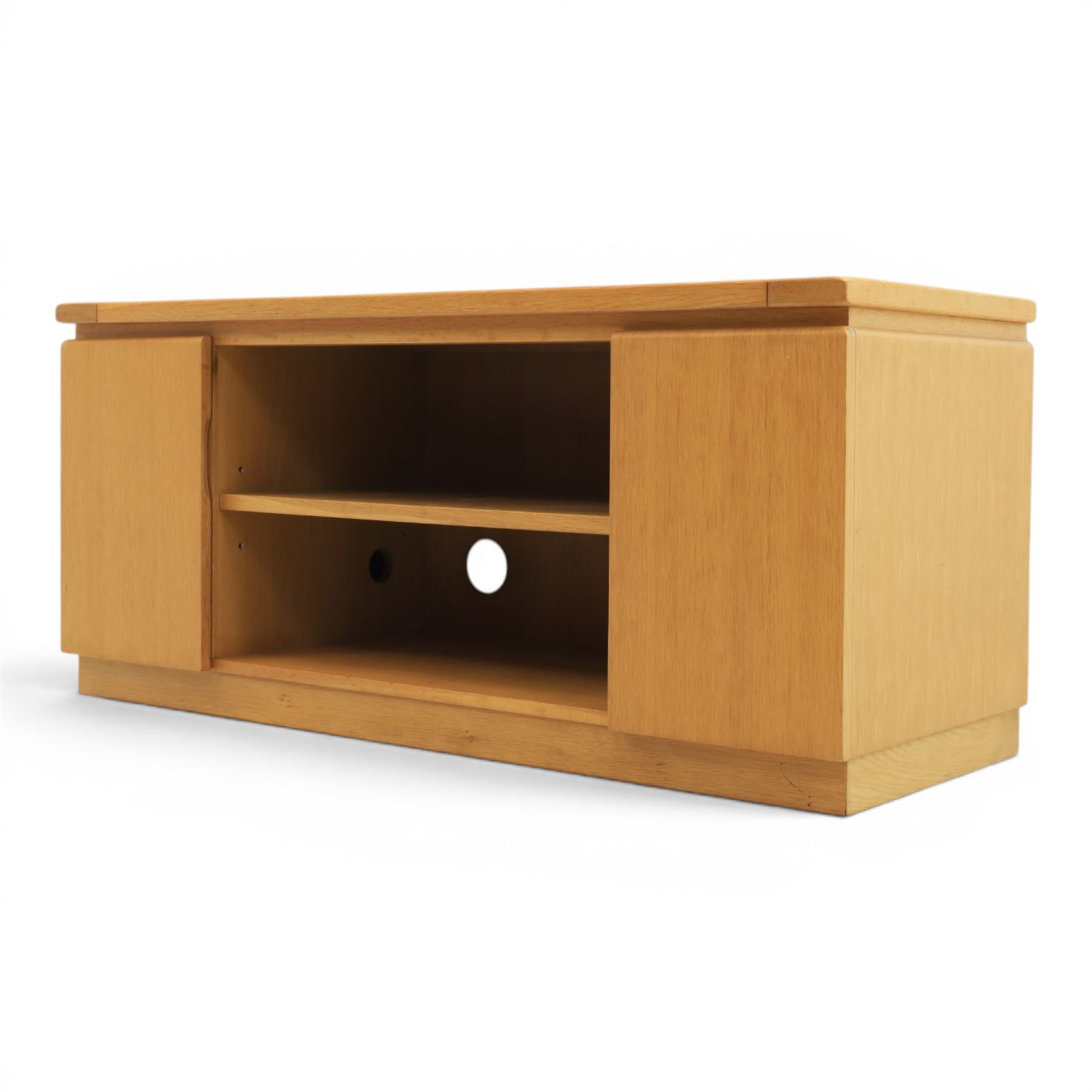 Contemporary light oak television or media unit, two cupboards and two open shelves