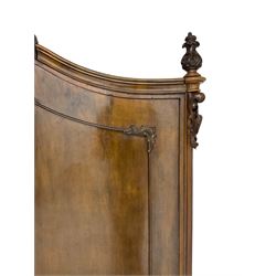 Early 20th century Italian walnut armoire wardrobe, the pierced and scrolling pediment carved with acanthus leaf detail, flanked by two scrolling cartouche with matching corbels below, the two panelled doors with applied carved rinceaux slips, with a central spiral turned upright, enclosing single shelf and hooks, raised on scroll feet