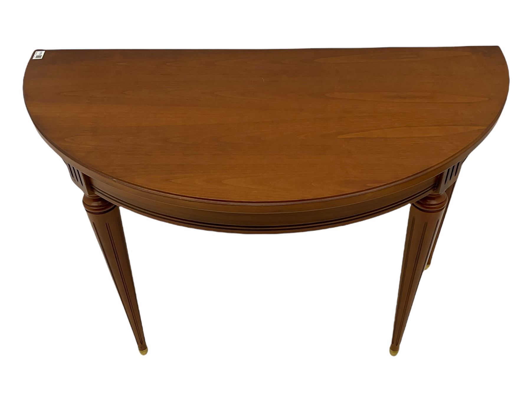 Contemporary cherry wood demi-lune console table, on tapering turned supports with fluting