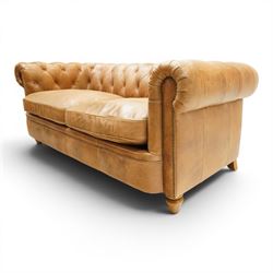 Alexander James - Chesterfield tan three seat sofa, button backed with scrolled arms, brass studded trim raised on light wood turned feet