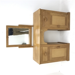 'Lizardman' oak dressing table, two drawers and two panelled cupboards, raised swing mirror, by Derek Slater of Crayke, W110cm, H134cm, D38cm