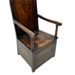 18th century elm box-seat lambing chair, dished cresting rail over panelled back, panelled hinged lid flanked by two turned arm supports