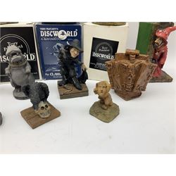 Terry Pratchett Discworld figures, comprising Roderick the hippo, DWE2, a 1995 event piece, Rincewind bookend, DW11, Death bookend, DW12, Librarians wizard knob, boxed, DW55, the luggage, boxed, DW04, tankard from the mended drum, DW21, Teppic the assassin, DW32, Greebo, DW45, Herne the hunted, DW64, Gaspode,  DW31, Quoth on skull, DW49 and Dibbler's compass DW16. 